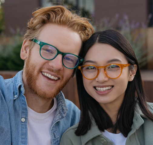 Couple wearing eyeglasses at LaCroix Eye Carea
