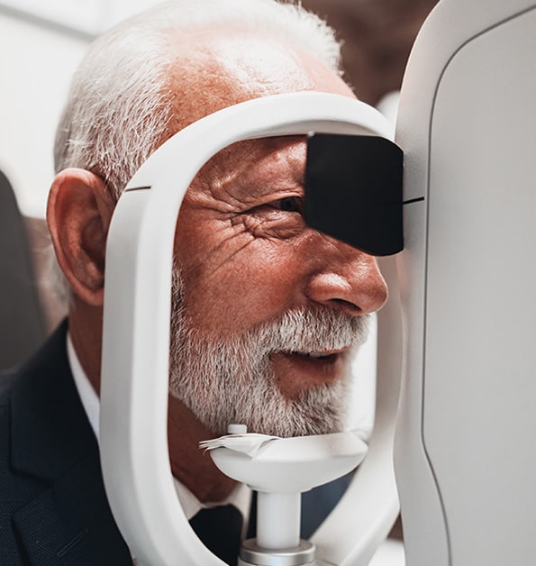 Man getting a comprehensive eye exam at LaCroix Eye Care