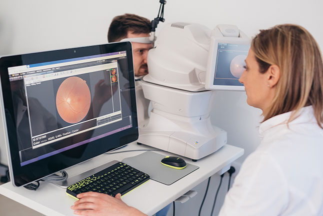 Man undergo eye exam at LaCroix Eye Care