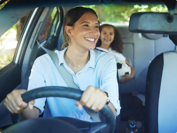 woman driving with her child