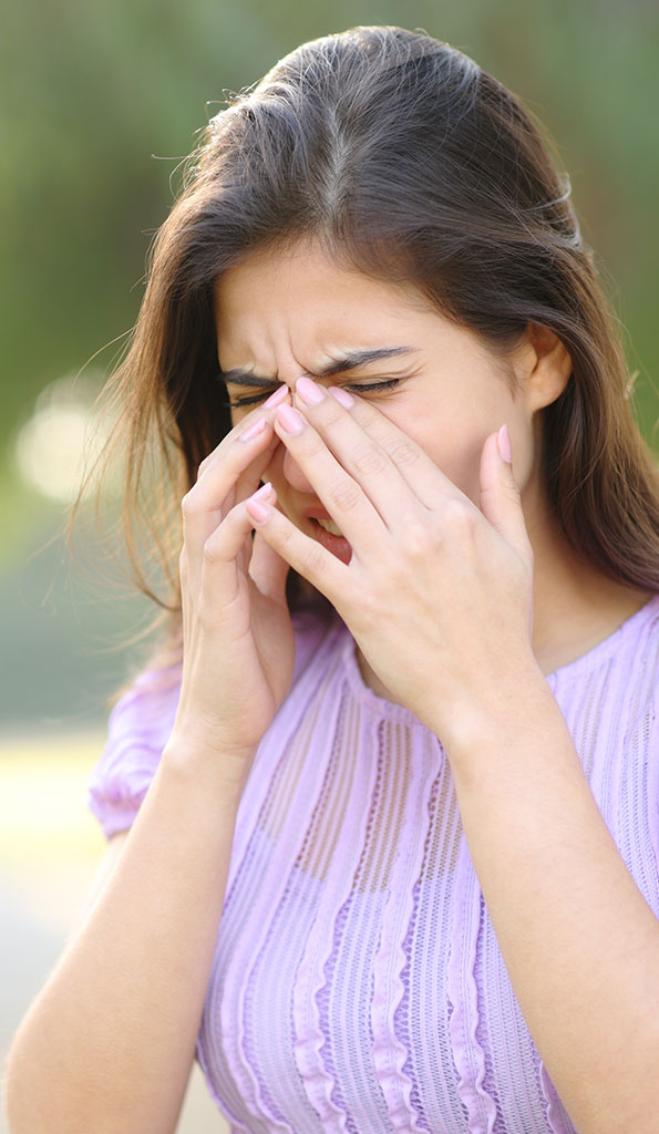 Woman suffering from dry eye